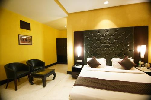 Hotel The Golden Oak Central by Citrus Primeにあるベッド