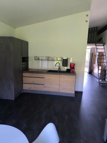 a kitchen with a sink and a counter top at Stadt und See Nahes Appartment in Klagenfurt