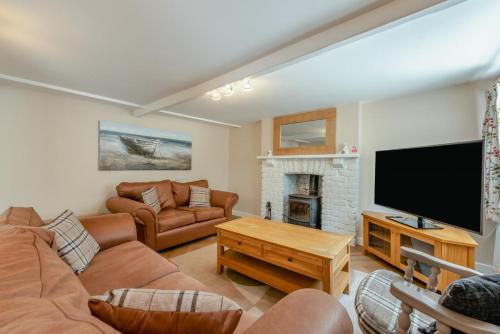 Μια τηλεόραση ή/και κέντρο ψυχαγωγίας στο 5 Bed in Mynyddygarreg oc-c32367