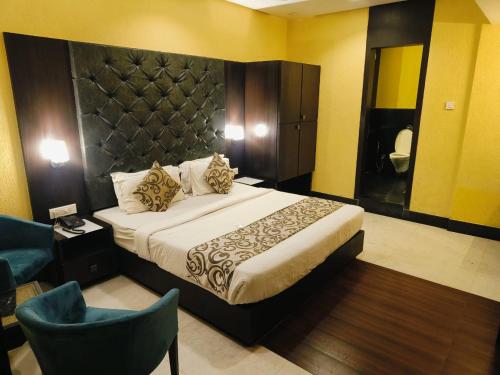 Hotel The Golden Oak Central by Citrus Primeにあるベッド