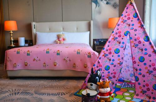 Katil atau katil-katil dalam bilik di Hilton Urumqi