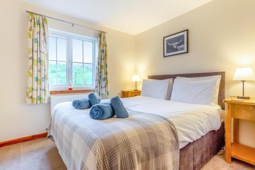 Ένα ή περισσότερα κρεβάτια σε δωμάτιο στο 3 Bed in Glenhinnisdal oc-s32340