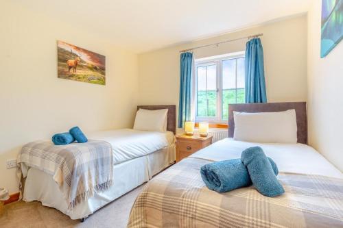 Ένα ή περισσότερα κρεβάτια σε δωμάτιο στο 3 Bed in Glenhinnisdal oc-s32340