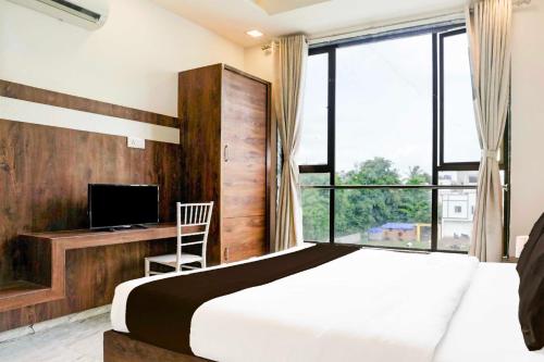 Μια τηλεόραση ή/και κέντρο ψυχαγωγίας στο Hotel O Shirdi