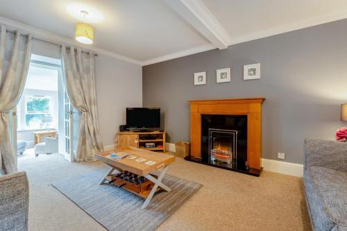 a living room with a couch and a fireplace at 2 Bed in Methven oc-c32362 in Methven