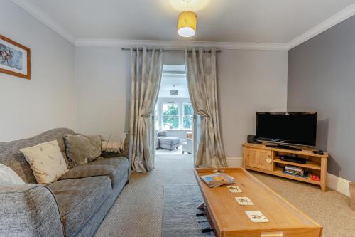 a living room with a couch and a tv at 2 Bed in Methven oc-c32362 in Methven