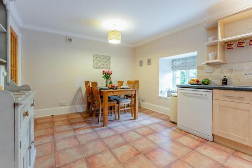 a kitchen with a table and a dining room at 2 Bed in Methven oc-c32362 in Methven