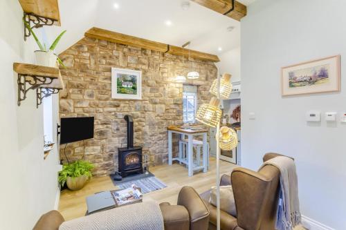 TV a/nebo společenská místnost v ubytování 1 Bed in Drumnadrochit oc-t32404
