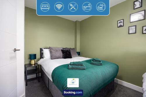 a bedroom with a bed with a blue sign above it at Cosy Retreat By Green Haven Escapes Short Lets & Serviced Accommodation Seacroft With Free Off-Street Parking & Pet-Friendly in Killingbeck