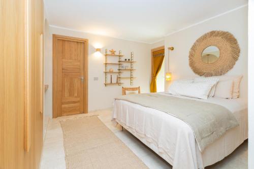 Katil atau katil-katil dalam bilik di Luxury Villa in Cala dei Ginepri