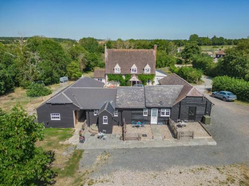 an aerial view of a house with a yard at 1 Bed in Great Sampford oc-f32654 in Great Sampford