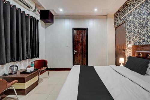 Ένα ή περισσότερα κρεβάτια σε δωμάτιο στο Hotel O BG Hotel