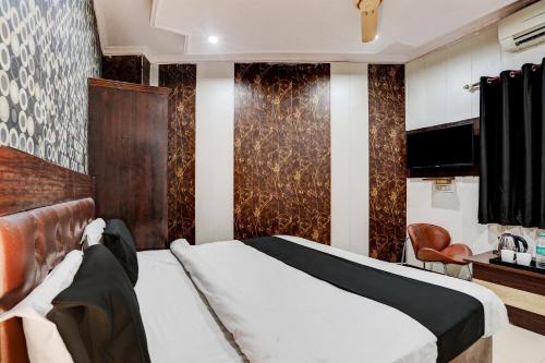 Ένα ή περισσότερα κρεβάτια σε δωμάτιο στο Hotel O BG Hotel