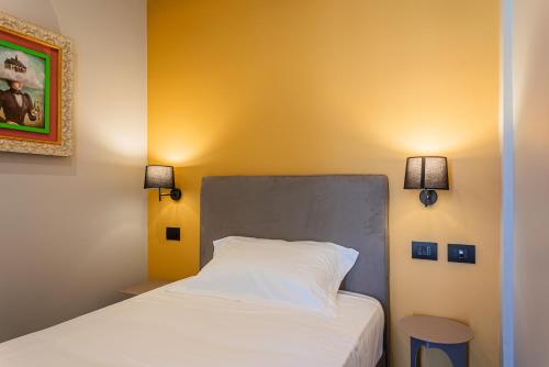 Letto o letti in una camera di Fontana Falconieri Boutique Hotel