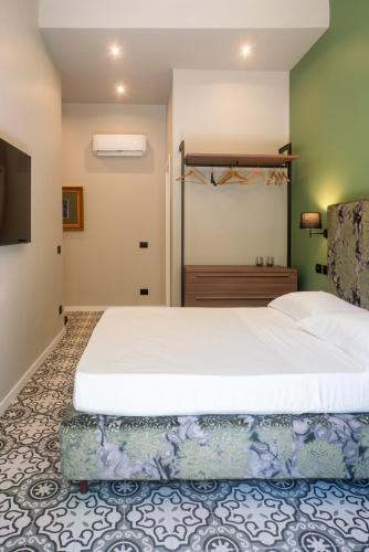 Letto o letti in una camera di Fontana Falconieri Boutique Hotel