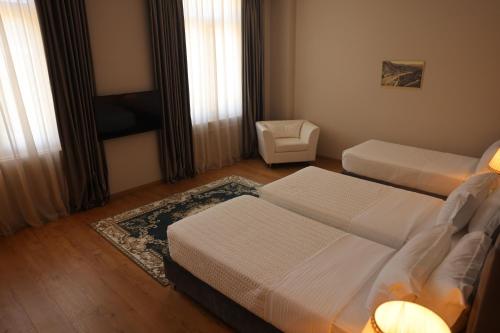 Postel nebo postele na pokoji v ubytování Hotel Colombo
