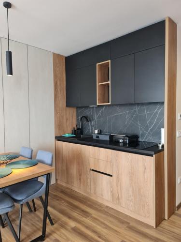 Una cocina o cocineta en SkyKop Apartmani
