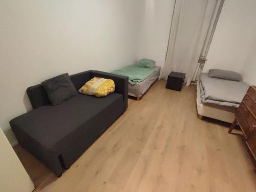Postel nebo postele na pokoji v ubytování Central Kelkheim apartment near station