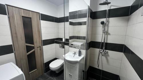 Koupelna v ubytování Astra Urban Leaf