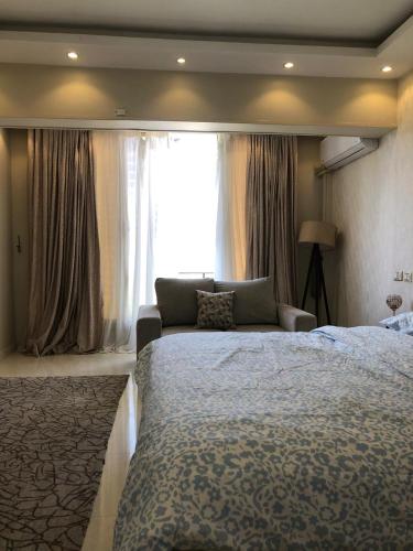 Katil atau katil-katil dalam bilik di Cairo vida apartment