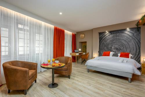 Postel nebo postele na pokoji v ubytování Le 16-Appart'Hôtel-GregIMMO