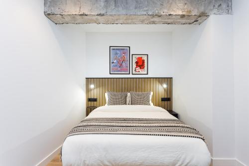 Ένα ή περισσότερα κρεβάτια σε δωμάτιο στο Suites Rooms La Rosa