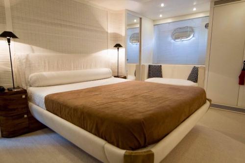 a bedroom with a large bed and a window at Borbon Home luxury rooms & SPA in Palermo