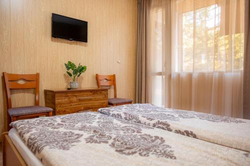 Ένα ή περισσότερα κρεβάτια σε δωμάτιο στο Camping Verila