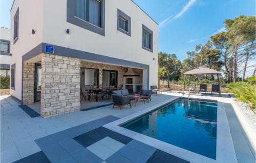 an image of a house with a swimming pool at Villa Royal House 2 in Pašman
