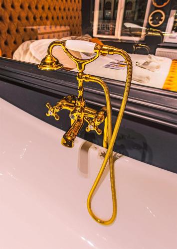 a yellow rope on a table in a store at Hôtel Palmarès Spa in Spa