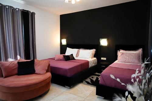 Postel nebo postele na pokoji v ubytování Ducato di Aria , Luxury Apartments
