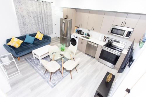 an overhead view of a kitchen and a living room at Lux Capitol Hill Vacation Home, In-House Services in Washington
