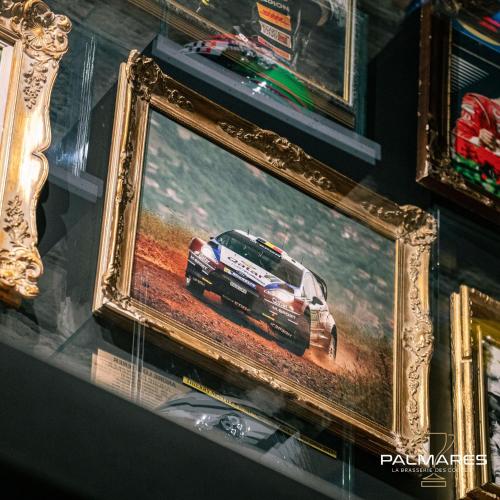 a picture of a car on a tv screen at Hôtel Palmarès Spa in Spa
