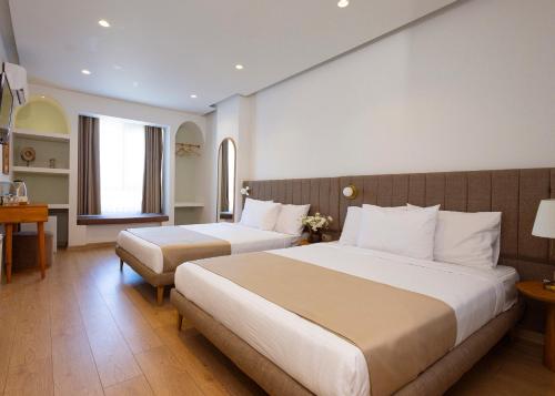 Meshk Airport Hotelにあるベッド