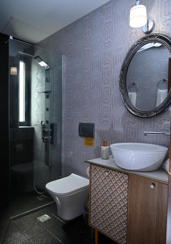 Koupelna v ubytování Ducato di Aria , Luxury Apartments