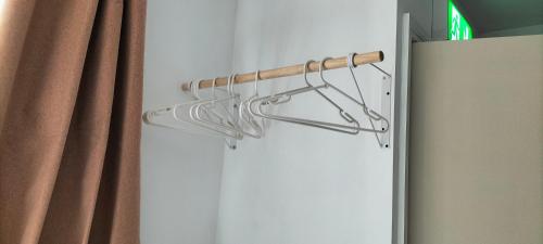 a towel rack on the side of a refrigerator at Blue Moon Self Catering Accommodation in Dunkineely