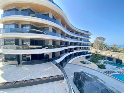 an image of a building with a swimming pool at Via Mar Residence - Alanya Experience in Alanya