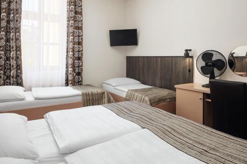 Hotel Superior Pragueにあるベッド