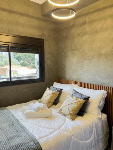 Katil atau katil-katil dalam bilik di Cozy and complete studio - Brooklin SP