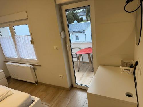 Letto o letti in una camera di Asiatisches Landhaus Pension