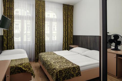 Hotel Superior Pragueにあるベッド