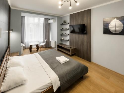 Postel nebo postele na pokoji v ubytování Lux.Ap4you.if