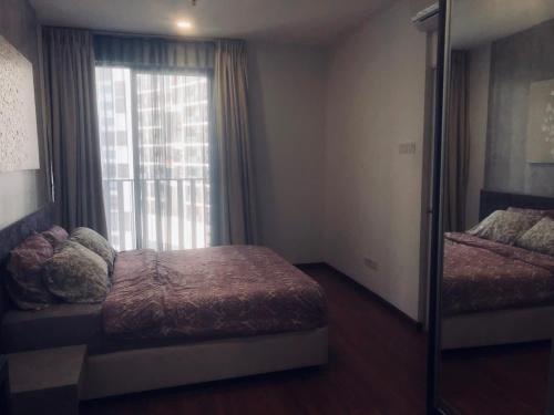 Postel nebo postele na pokoji v ubytování Manhattan Homes at i-City - WiFi TV Box & 1 Car Park