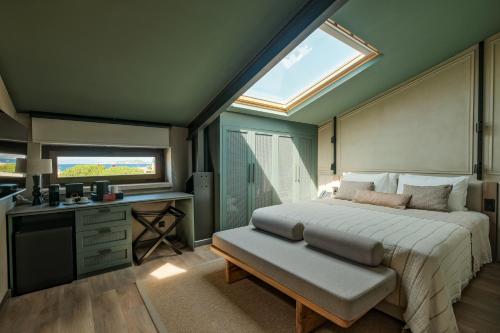 Lecole Hotel By Cityloftにあるベッド