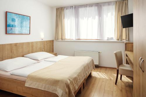 Hotel Superior Pragueにあるベッド