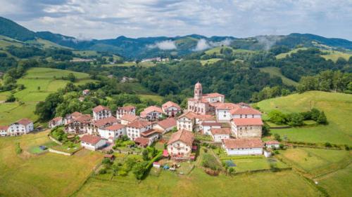 an aerial view of a large house in a field at Apartamento Larrazu II Agroturismo Baztán in Arráyoz