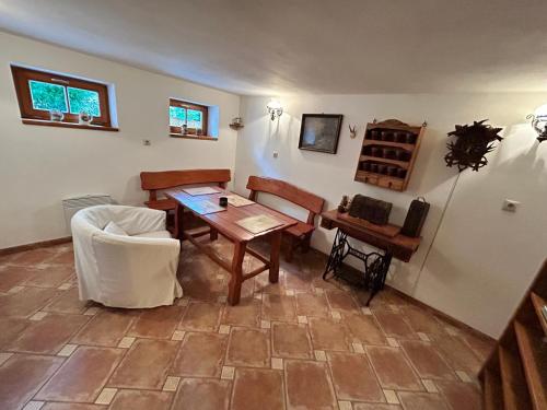 a room with a table and a chair and a table and a tablektop at Nicole in Hartau