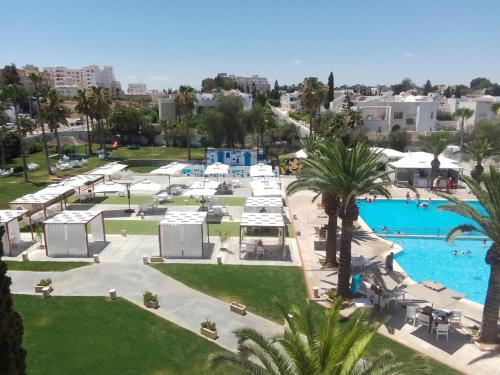 an aerial view of a resort with a pool at Golf Residence- Families and Couples Only in Hammam Sousse