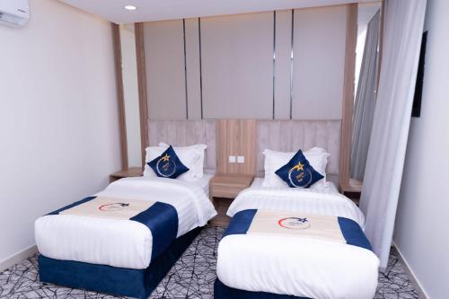 Katil atau katil-katil dalam bilik di فندق نجمة مارينا Marina Star Hotel