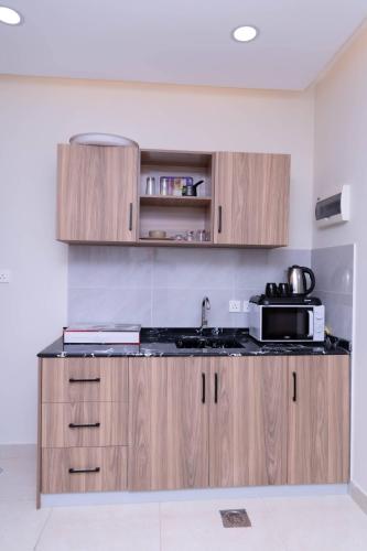 Dapur atau dapur kecil di فندق نجمة مارينا Marina Star Hotel